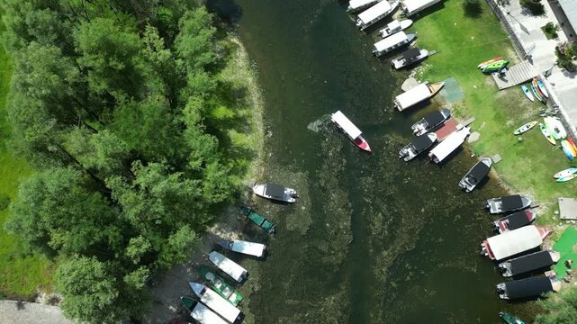 Drone view of boats on Rijeka Crnojevica river, Montenegro