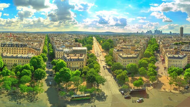 Paris 360 degrees skyline panorama from top of Arc de Triomphe on Champs Elysees street.Tour Eiffel tower, Basilica of the Sacred Heart and Tour Montparnasse tower landmarks in Paris, France, Europe.
