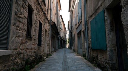 Fototapeta premium A quiet view of an ancient European city street featuring aged stone architecture and quaint wooden shopfronts