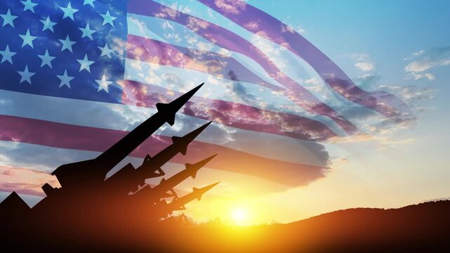 The missiles are aimed at the sky at sunset with USA flag. Bomb, chemical weapons, missile defense, a system of salvo fire.