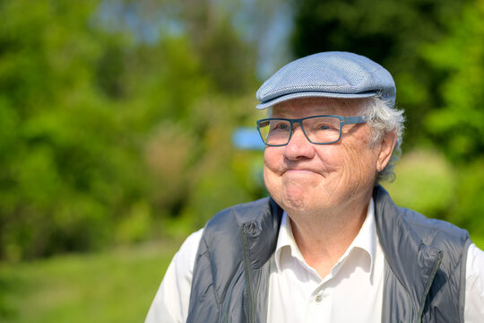 Thoughtful Senior Man Outdoor Portrait