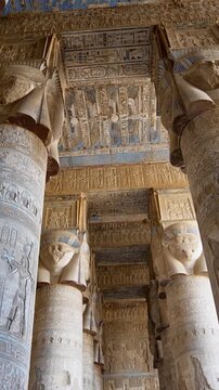 Dendera temple or Temple of Hathor. Painted columns with goddess faces and