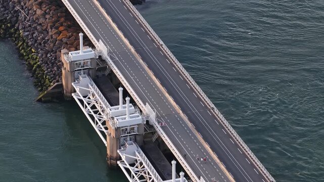 Aerial view of oosterscheldekering storm surge barrier traffic