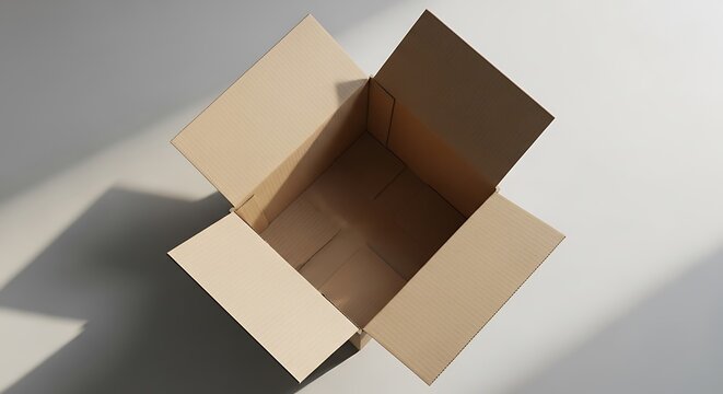 Open empty cardboard box on surface.