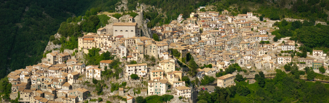 Cervara di Roma medieval borgo hilltop town panoramic view before sunset. Scenic landscape of authentic historic mountain village near Rome with stone houses and green hills. World Print.