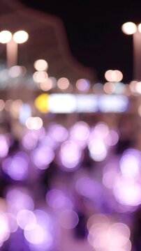 Aesthetic Blurred Night Scene Featuring Soft Purple Lights and Bokeh Effect, Capturing the Essence of an Enchanted Evening Atmosphere