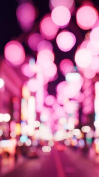 A Vibrant Night Scene with Blurry Neon Lights and Colorful Bokeh Effects Creating a Dreamlike Atmosphere in a Bustling Cityscape