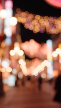 A Vibrant, Blurred Scene Capturing the Enchantment of City Life at Night, Showcasing Beautiful Lights and a Lively Atmosphere in a Bustling Urban Environment