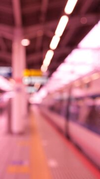 A Captivating Glimpse of a Train Station: Exploring the Dynamics of Movement and Anticipation in a Blurred Visual Journey