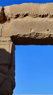 Dendera temple Hathor head columns with cow ears supporting massive stone