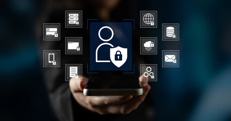 Fototapeta premium Digital Security Concept with User Protection and Lock Symbol on Smartphone Holding in Business Environment. Glyphic.