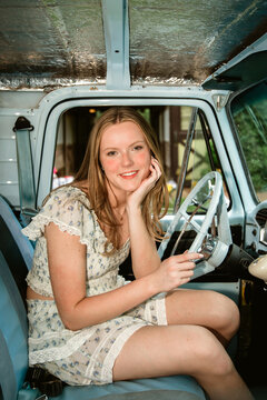 woman sitting in truck