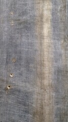 Fototapeta premium Wood panel showing scratches and nail holes in surface
