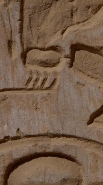 Close-up of detailed hieroglyphic rows with cartouches carved in stone lintel at Seti I temple Luxor Egypt.