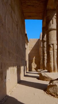 Osiride colonnade with hieroglyphic wall at Seti I mortuary temple, Luxor Egypt