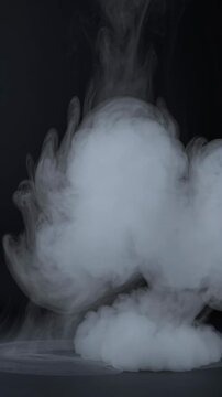 White mist and steam rising against a black background, representing air pollution, chemical reactions, and atmospheric phenomena in a cinematic slow motion effect