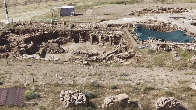 Cinematic Drone Flight Over Karahantepe Archaeological Site in Sanliurfa, Turkiye &ndash; Ancient Neolithic Heritage from Above