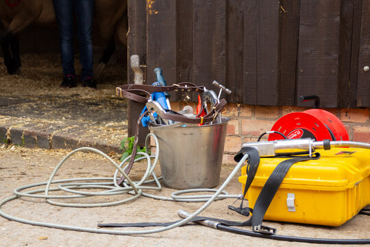 Equine dentist bucket of tools of the trade ready to examine horses teeth.Rasp, clamps and other equipment washed and ready to use.