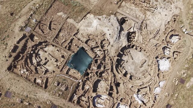 Cinematic Drone Flight Over Karahantepe Archaeological Site in Sanliurfa, Turkiye &ndash; Ancient Neolithic Heritage from Above