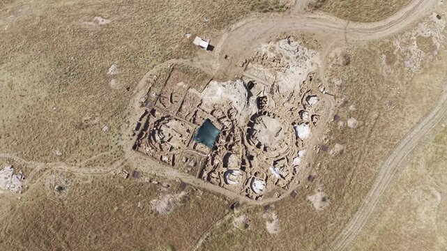 Cinematic Drone Flight Over Karahantepe Archaeological Site in Sanliurfa, Turkiye &ndash; Ancient Neolithic Heritage from Above