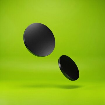ech 3D Floating Matte Black Metallic Discs for Sneaker Apparel Display on Neon Green Minimal Background