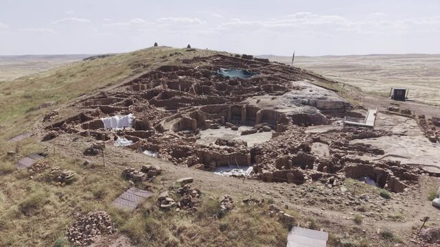 Cinematic Drone Flight Over Karahantepe Archaeological Site in Sanliurfa, Turkiye &ndash; Ancient Neolithic Heritage from Above