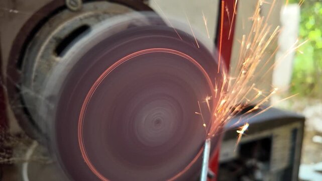 Close-up view of sharpening. 4K Metal Spark.