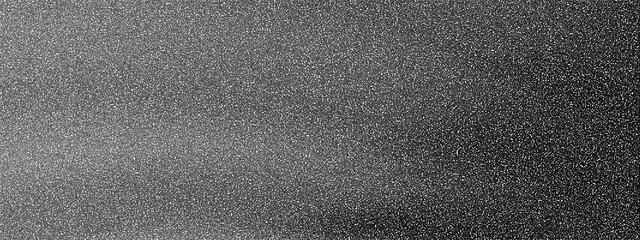 Fototapeta premium Gray textured surface with small white specks and gradient effect from light to dark gray tones transparent background