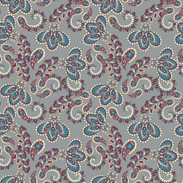 Floral seamless pattern with paisley ornament. Vector illustration in asian textile style