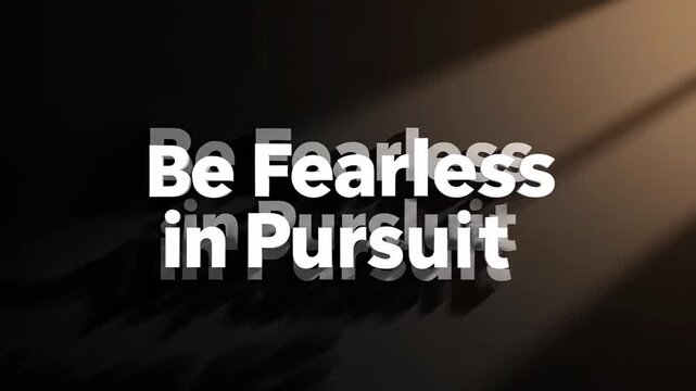 Graphic with white text "Be Fearless in Pursuit" and shadows on black backdrop