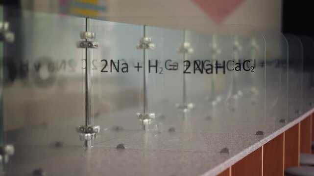 Chemical reaction showing the breakdown of hydrogen peroxide into water and oxygen at a science exhibition in a lab