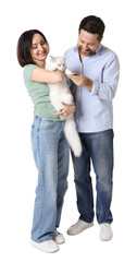 Fototapeta premium Couple with their cute cat on white background