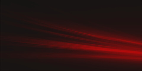 Abstract streaks of vivid red light swirl and blend against a deep black backdrop, creating a dynamic and visually striking background that evokes a sense of mystery and energy. © jaduuu