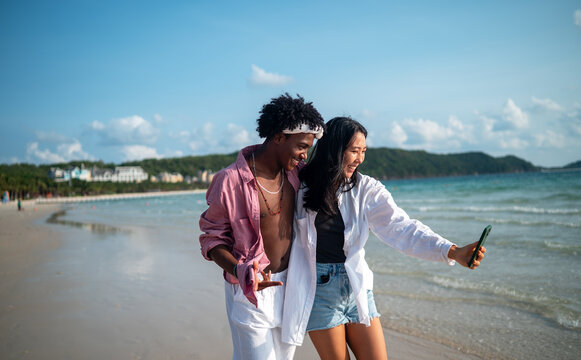 Happy couple taking selfie at the beach on summer holiday, Tourism, beach, summer and travel