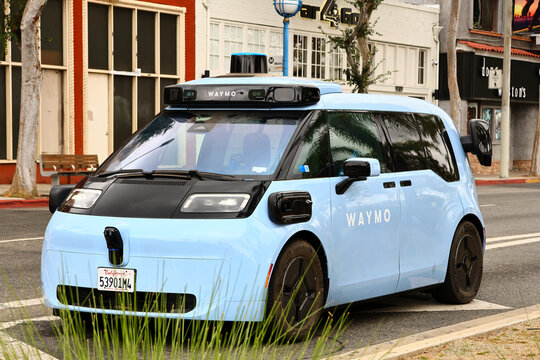 Los Angeles, California &ndash; July 1, 2026: Waymo Zeekr RT autonomous robotaxi operating on a city street