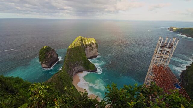 Panoramic View of Kelingking Beach With Turquoise Water White Sand and Dramatic Coastal Cliffs in Slow Motion