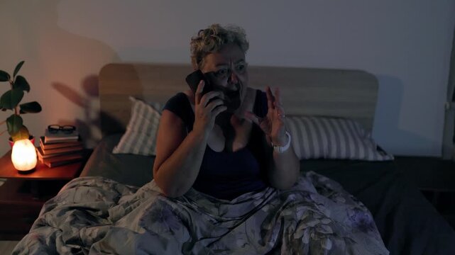 Overweight Desperate Mature Woman Holding Face Waking From Nightmare In Bed At Night