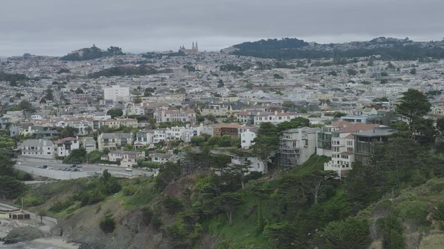 San Francisco Residential Hillside and Sandy Cove Aerial Shot On Overcast Day