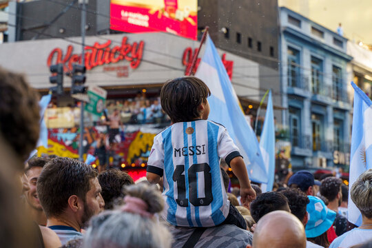 Buenos Aires, Argentina - June 25, 2026: Young fan wearing Messi jersey celebrating Argentina's World Cup victory
