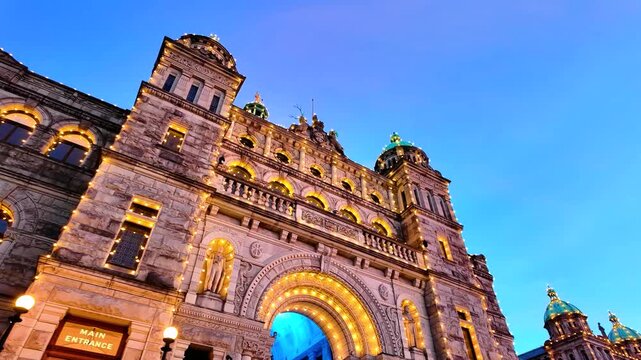 Victoria, BC, Canada &ndash; July 1, 2026: Illuminated British Columbia Parliament Buildings main entrance at twilight