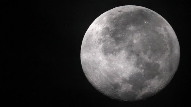 Full waning gibbous moon in the morning sky