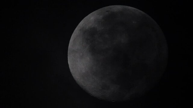 Waning gibbous moon covered by thick cloud