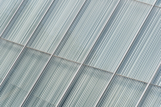 white modern corrugated metal wall texture with shadow for architecture background	
