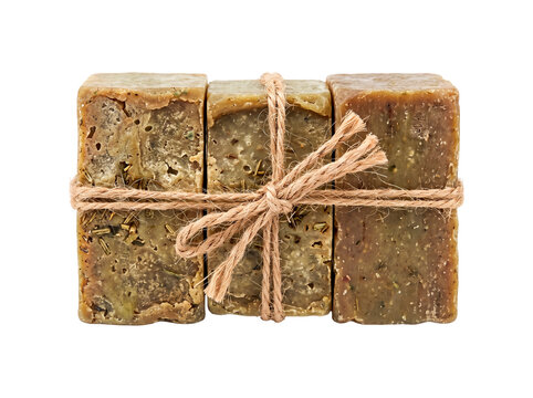 Three rustic handmade herbal soaps tied together with natural twine for a natural and organic product presentation PNG Isolated on transparent background