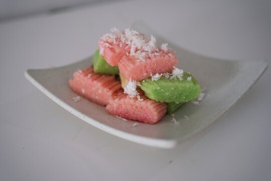 Getuk Lindri is a traditional Indonesian snack, made from mashed cassava made from cassava that have been peeled, boiled, mashed and colored, mixed with grated coconut, sugar and small amounts of salt