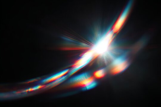 Prismatic Light Flare on Black Background - A Captivating Optical Phenomenon.