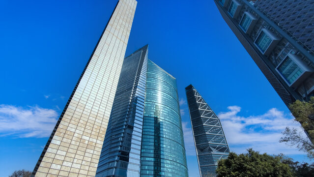 Mexico City Financial Center buildings near Paseo Reforma and Angel of Independence column.