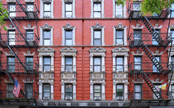 East Village area of Manhattan, colorful old apartment buildings with ornate window frames