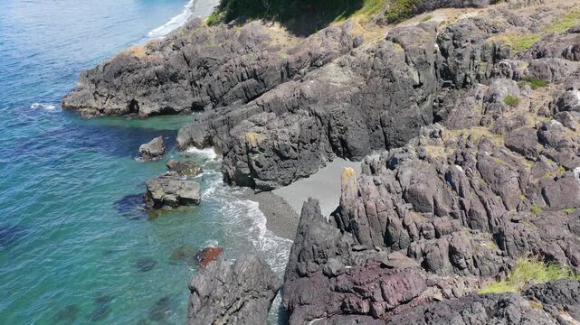 Aerial View of Rugged Coastline and Turquoise Waters at Otter Point, Vancouver Island