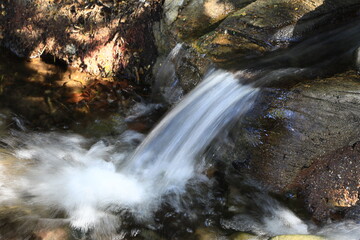Small waterfall from a spring water creek © Douglas